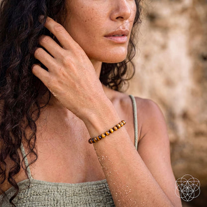 Conscious Items Built to Win 7A Grade Tiger’s Eye bracelet with 6mm beads, featuring polished tiger’s eye stones on a stretch cord.