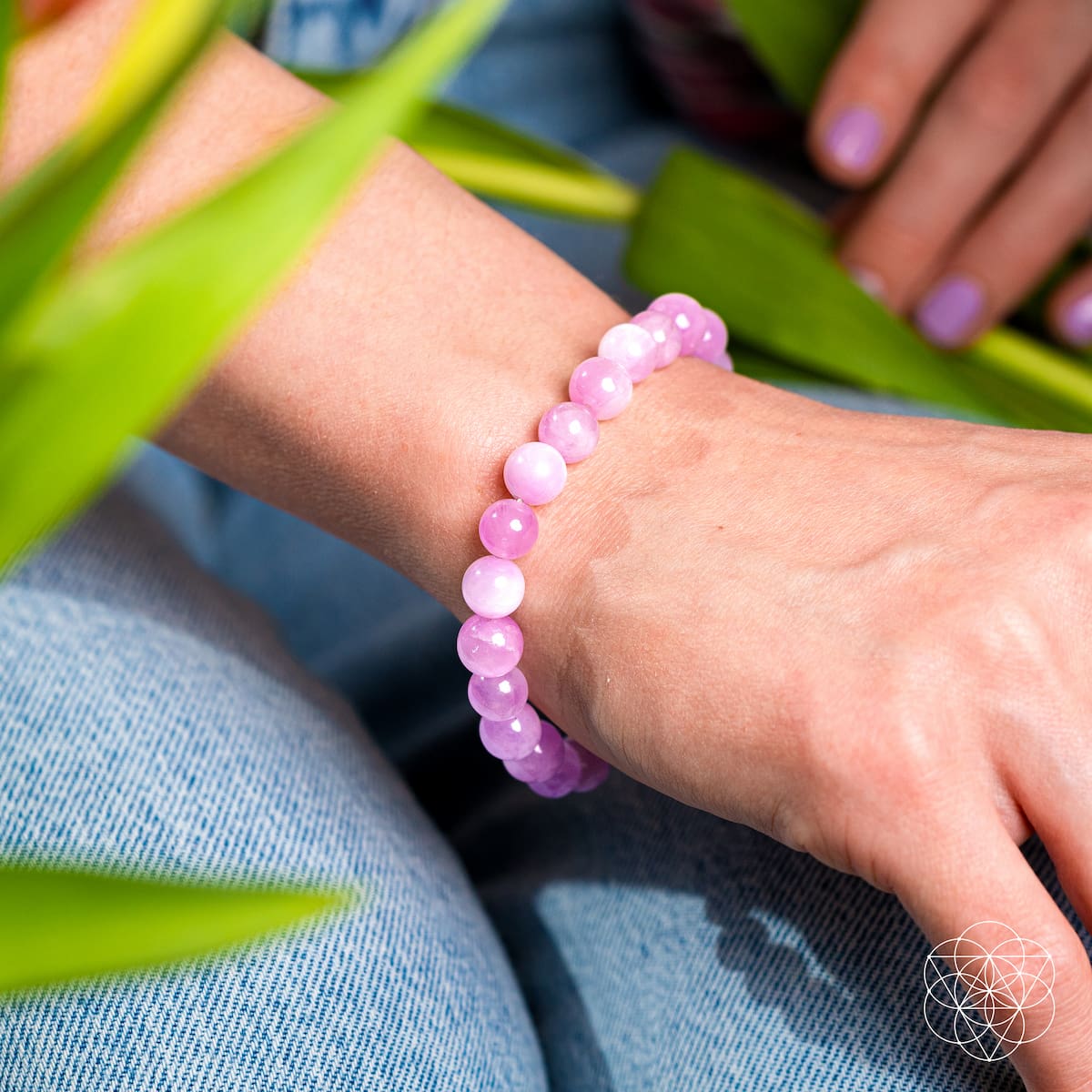 Pink Kunzite bracelet from Conscious Items featuring a delicate, elegant design with rose pink stones on a silver chain.