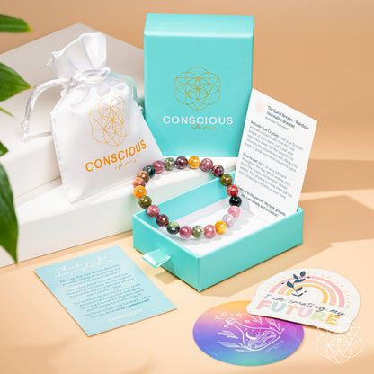 Rainbow Tourmaline bracelet by Conscious Items featuring spiral design and vibrant multicolored stones.
