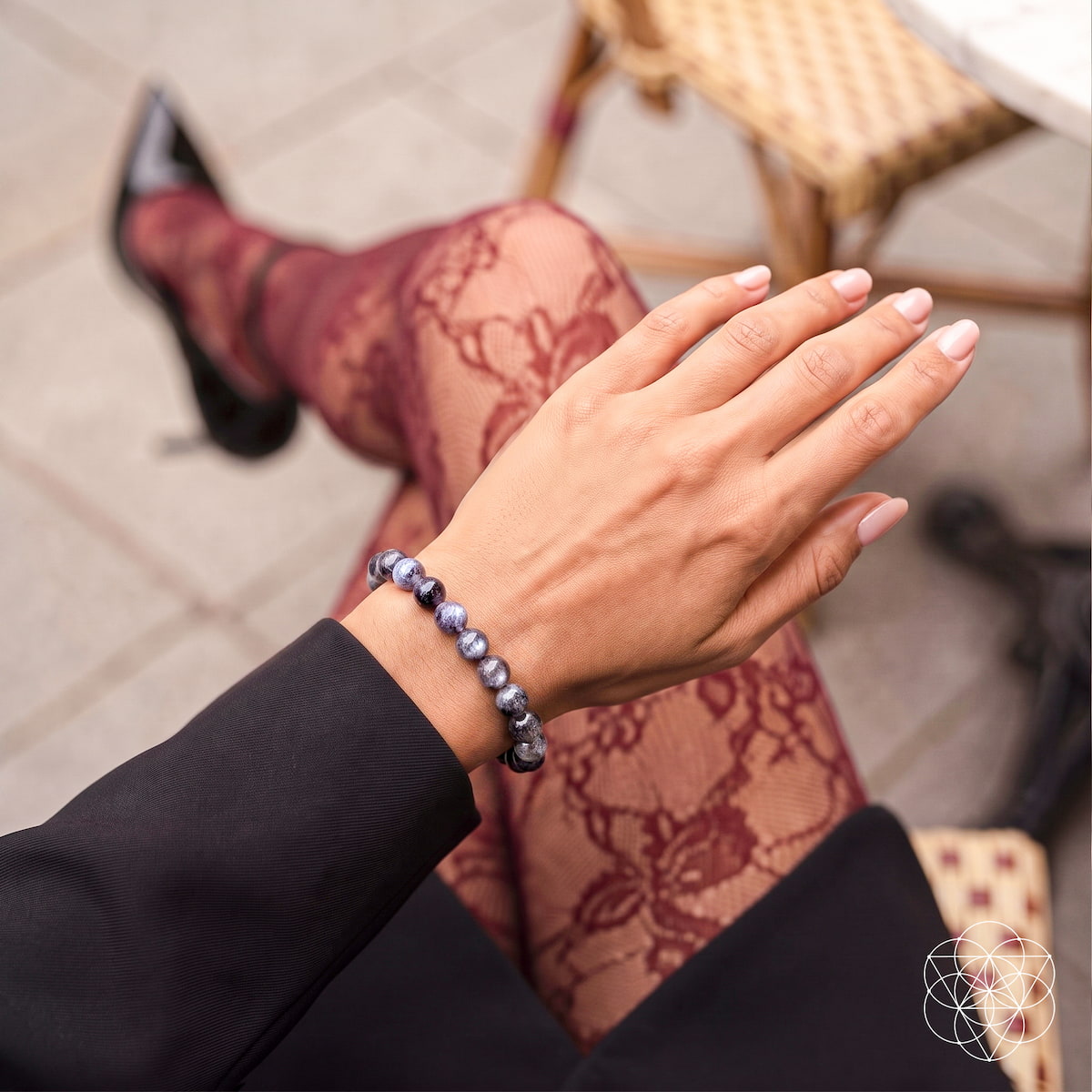 Black Moonstone bracelet from Conscious Items' The Empath’s Cord Cutter collection, featuring smooth, polished stones and a cord closure.