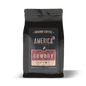 Ground Cowboy Blend coffee from America Supply Company LLC, featuring a rich, aromatic dark roast in a bag.