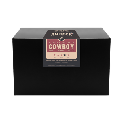 Box of Cowboy Blend coffee pods by America Supply Company LLC, featuring the coffee pod packaging with branding and product label.