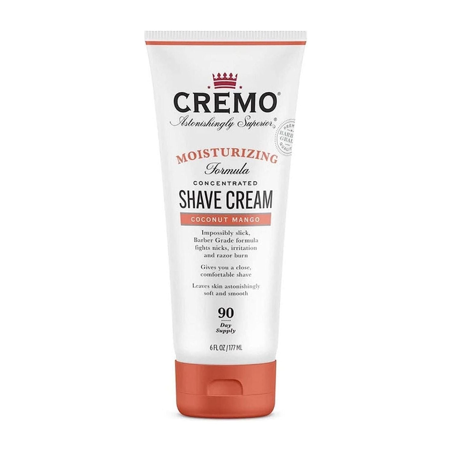 Cremo Moisturizing Shave Cream Coconut Mango in 6 oz tube, featuring a coconut mango scent, displayed on a bathroom counter.