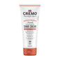 Cremo Moisturizing Shave Cream Coconut Mango in 6 oz tube, featuring a coconut mango scent, displayed on a bathroom counter.