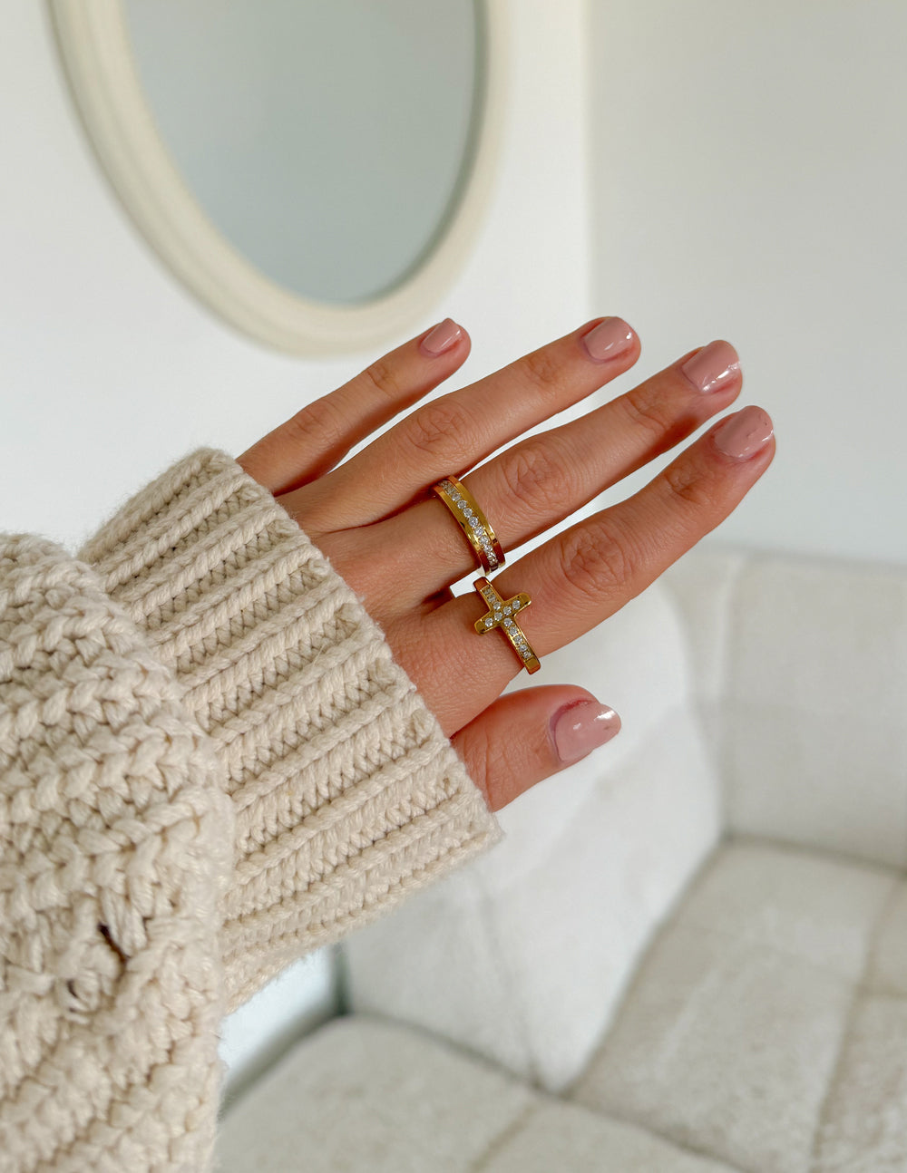 Elevated Faith Cross Eternity Gem Ring Set featuring silver rings with gemstone accents and intricate cross designs.