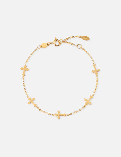 Elevated Faith cross link bracelet featuring metal links and religious cross charm on a neutral background.