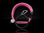Coldest Paracord Handle accessory with pink and black design on a dark background, showcasing durable woven paracord material.