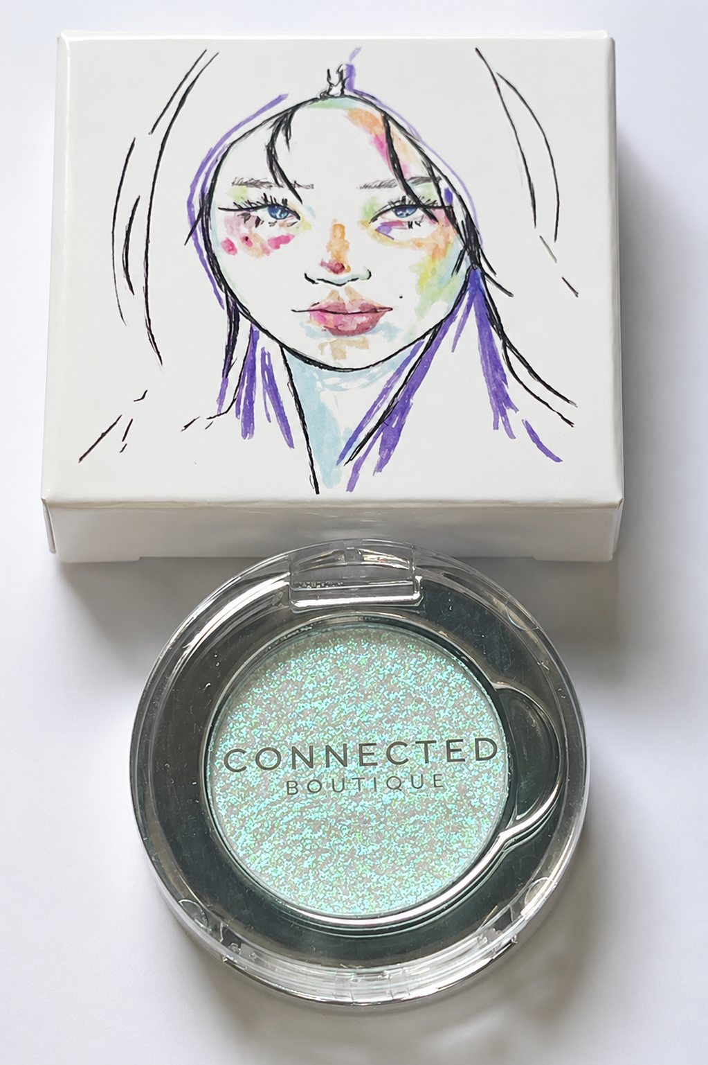 Connected Boutique Galactic Shift duochrome eyeshadow with color-shifting pressed pigment in vibrant purple and blue tones.