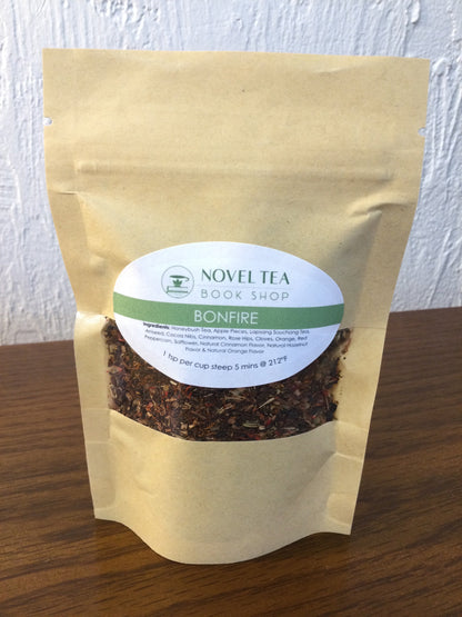 Loose leaf Bonfire Tea from Novel Tea Book Shop, showing dried tea leaves in a clear glass jar.