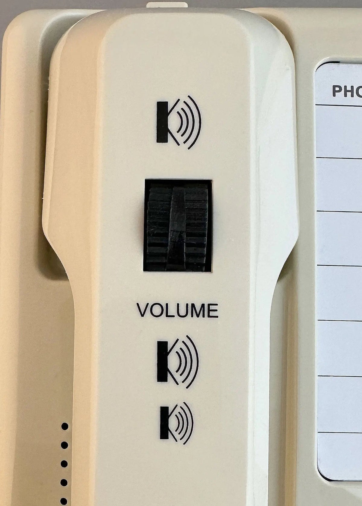 Cream D520U landline console phone by MedPat Solutions with volume wheel and USB-A and USB-C charging ports