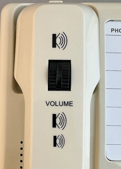 Cream D520U landline console phone by MedPat Solutions with volume wheel and USB-A and USB-C charging ports