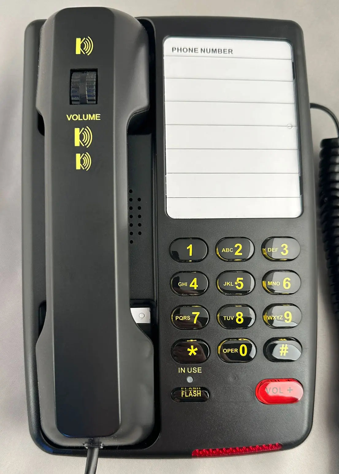 Black MedPat Solutions D520U landline console telephone with USB-A and USB-C charging ports and full-featured keypad.