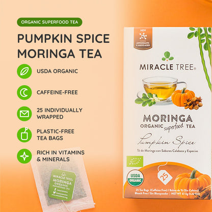 Organic Moringa Herbal Tea by Miracle Tree featuring pumpkin spice flavor in a tea bag on a wooden surface.