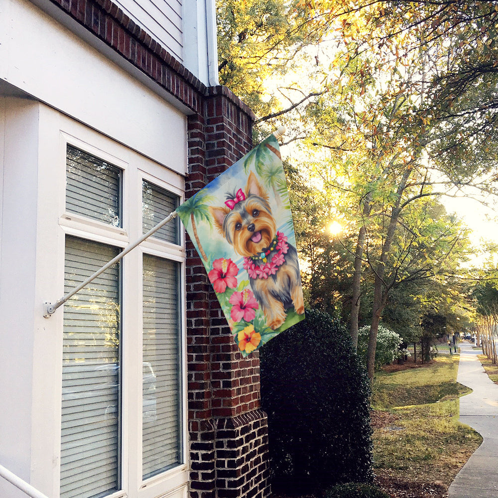 Yorkshire Terrier Luau House Flag by Caroline's Treasures hanging outdoors with tropical luau design and vibrant colors