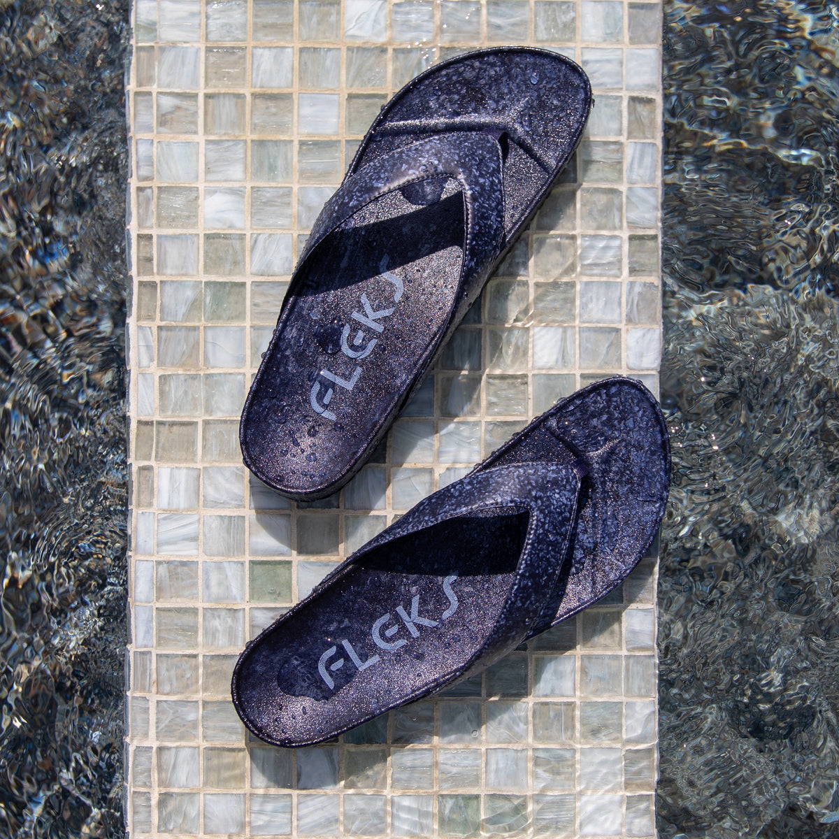 Fleks West Beach Flip Flop in deep blue sea color with cushioned straps and textured sole for comfortable beachwear.