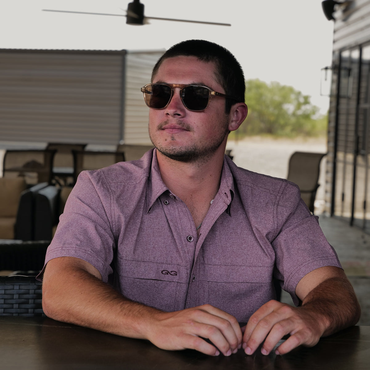 Maroon MicroTek shirt by GameGuard, close-up of lightweight, breathable fabric with subtle texture and collar detail.