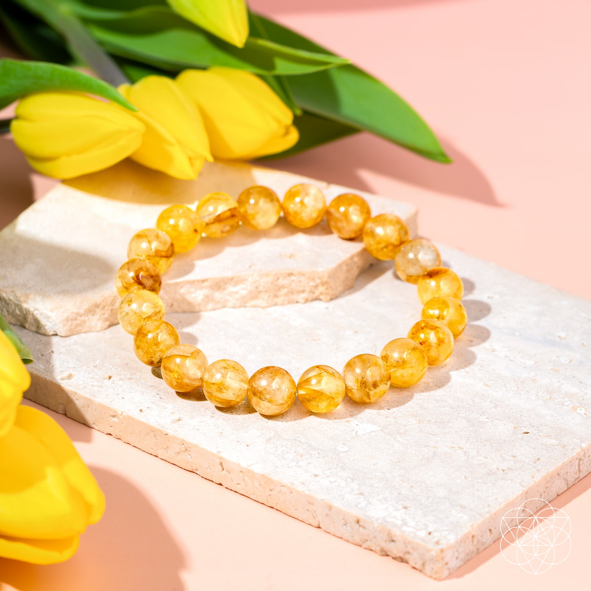 Golden Healer Quartz bracelet from Conscious Items featuring polished golden-colored gemstones on a delicate string.
