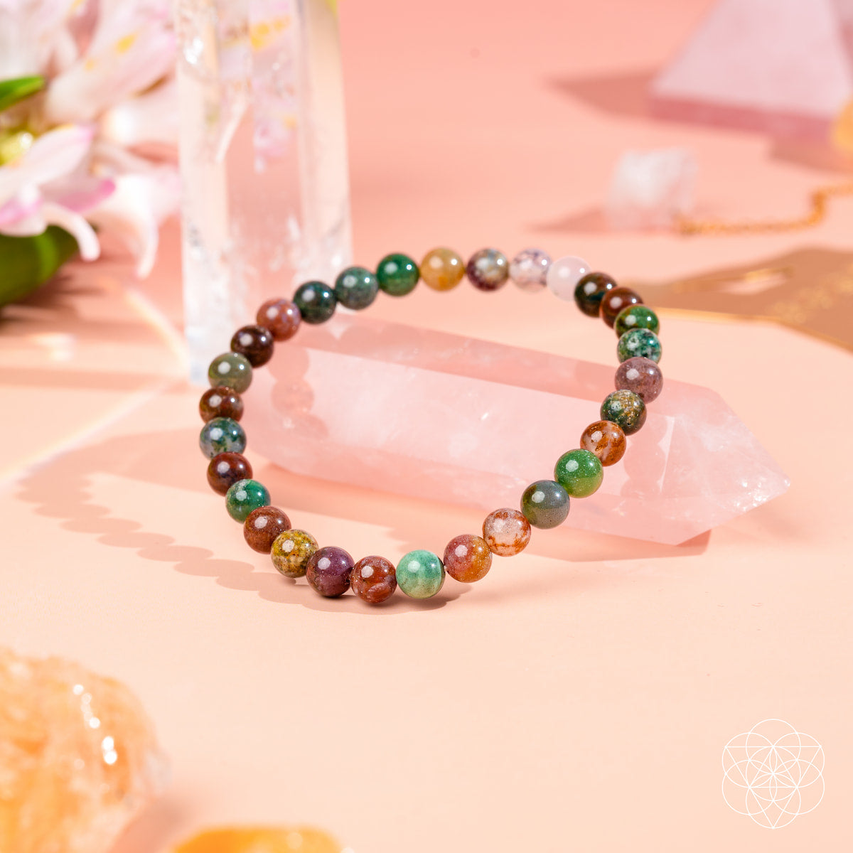 Conscious Items Energy Bracelet with 6mm beads, featuring natural stone and cord design, worn on a person's wrist.