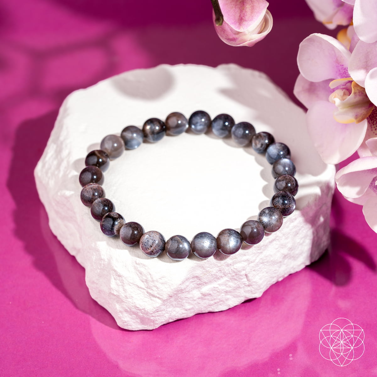 Black moonstone bracelet from The Empath’s Cord Cutter collection by Conscious Items, featuring smooth, polished stones on a delicate band.