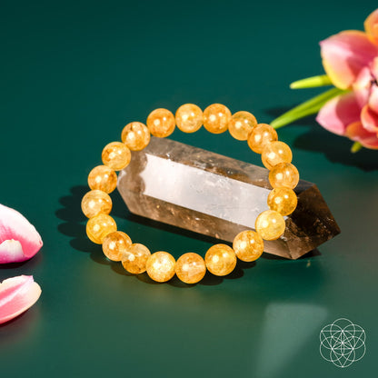 Golden Healer Quartz bracelet from Conscious Items featuring polished beads on a delicate elastic band.