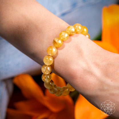 Golden Healer Quartz bracelet by Conscious Items featuring polished golden crystal beads on an elastic band.