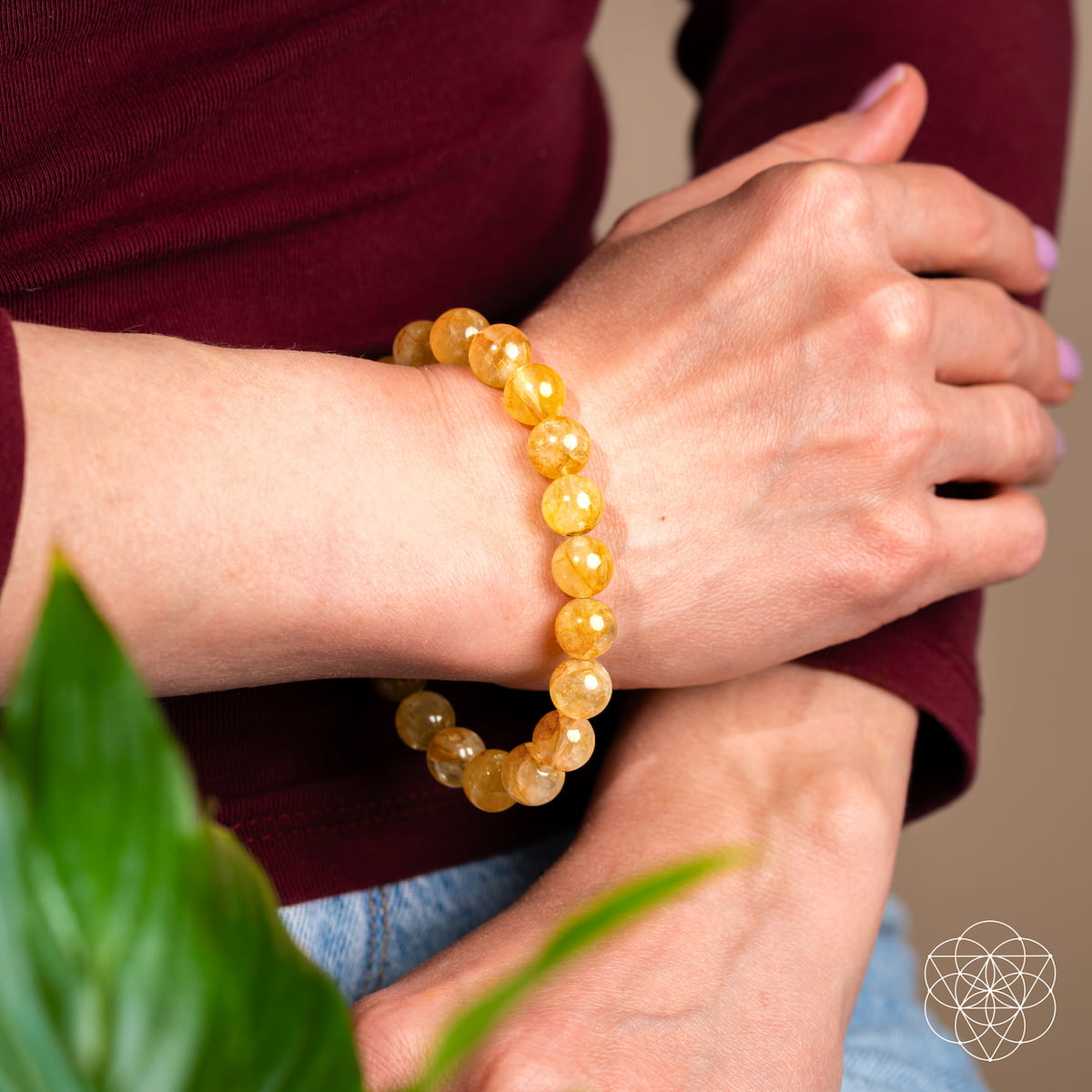 Golden Healer Quartz bracelet from Conscious Items featuring polished golden stones on a stretchy band.