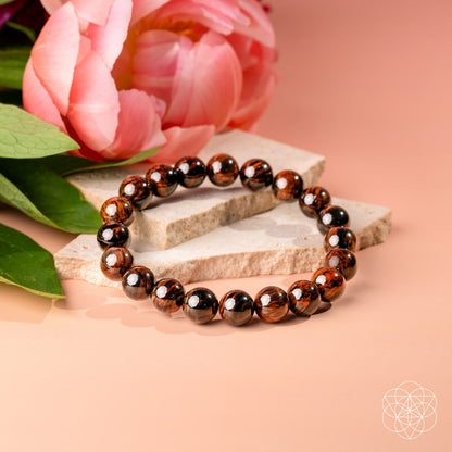 Mahogany Obsidian bracelet from Conscious Items, The Self-Sabotage Breaker collection, featuring polished polished stones on a durable band.