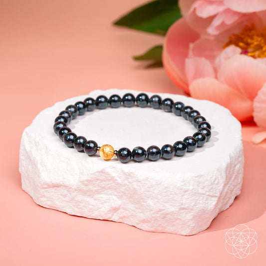 Deep healing bracelet featuring 6mm Arfvedsonite beads from Conscious Items, showcasing a stylish and calming accessory.