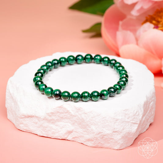 Close-up of The Calm Bracelet by Conscious Items, 6mm beaded bracelet with calming stones, displayed on a neutral background.