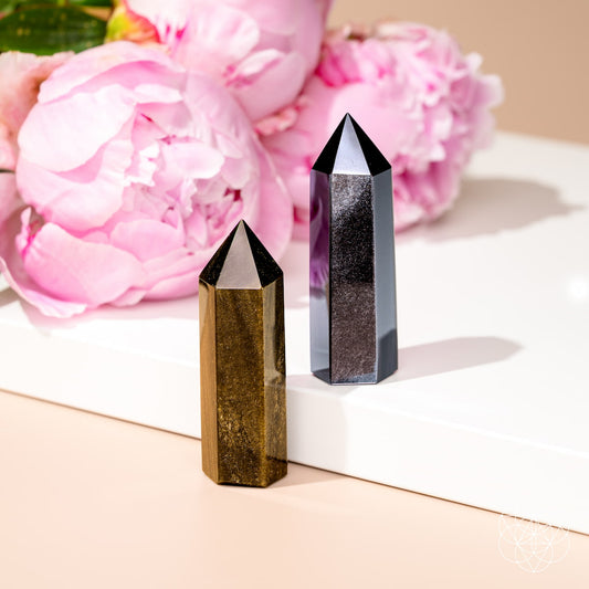 Gold and silver sheen obsidian points for home decoration, featuring natural stone with polished, pointed shapes.