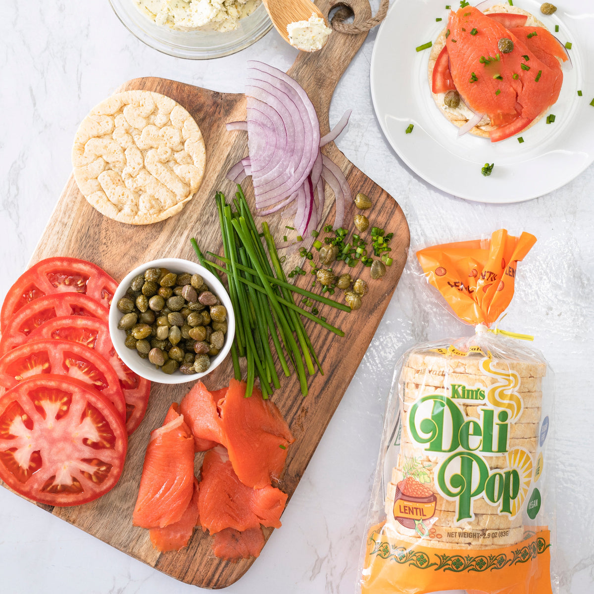 Kim's Magic Pop Lentil flavor snack in a clear bag, showing crispy, golden lentil chips on a white background.