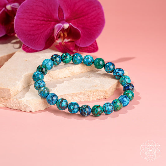 Peruvian Chrysocolla bracelet with vibrant blue-green stones, featuring natural, polished beads from Cleopatra’s Wise Stone collection.