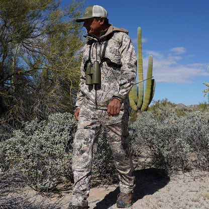 GameGuard GameGuard Guía Grande™ hunting pants shown in durable fabric with multiple pockets for outdoor hunting activities.