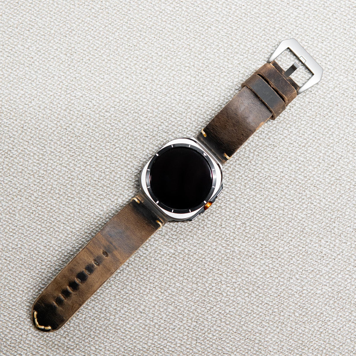 Robust Leather Strap R01 attached to Samsung Galaxy Watch Ultra, showcasing a stylish and durable watch band on a sleek smartwatch.