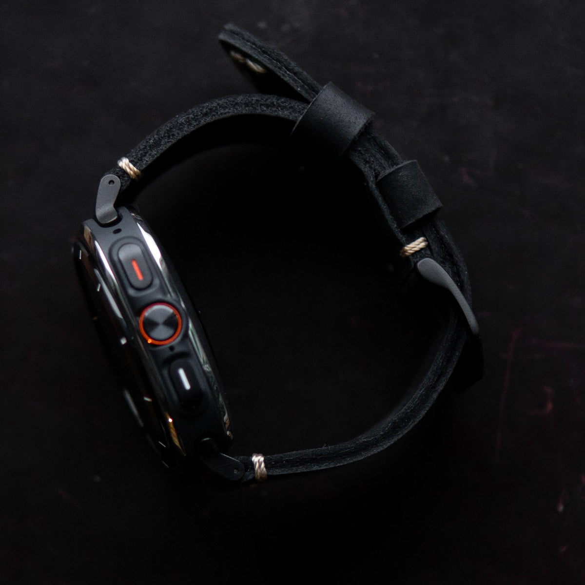 Robust Leather Strap R01 attached to Samsung Galaxy Watch Ultra, showing the brown genuine leather band on the watch.