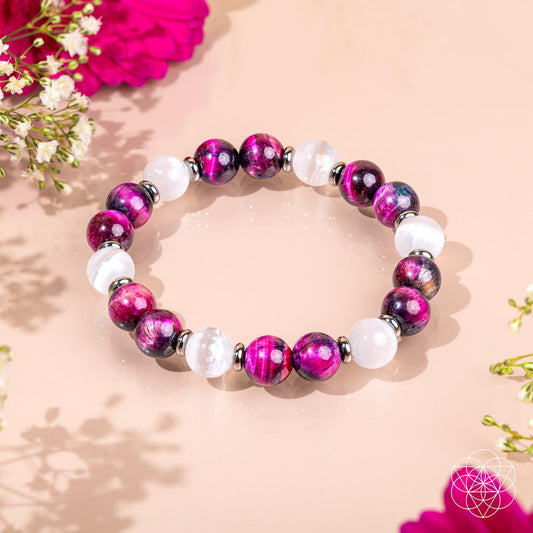 Pink galaxy tiger's eye bracelet from Conscious Items featuring vibrant pink and tiger's eye beads on a stylish bracelet design.