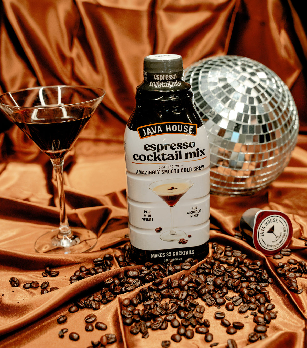 Java House Cold Brew Espresso Martini Mix bottle on a table, showcasing the product label and packaging.