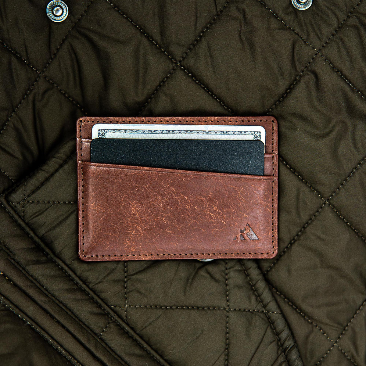 Robust leather card holder with multiple card slots and sleek design, shown on a plain background.