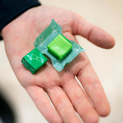 Close-up of 1 Shot Energy Energy Stack chews in colorful packaging, showing the energy chews product layout and vibrant design.