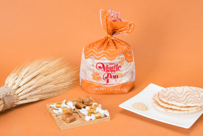 Kim's Magic Pop salted caramel flavor drizzled snack in a clear bowl, showcasing the crispy, caramel-coated popcorn.