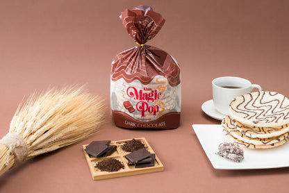 Kim's Magic Pop dark chocolate-flavored snack with drizzled dark chocolate, showcasing its crispy, caramelized surface and rich chocolate topping.