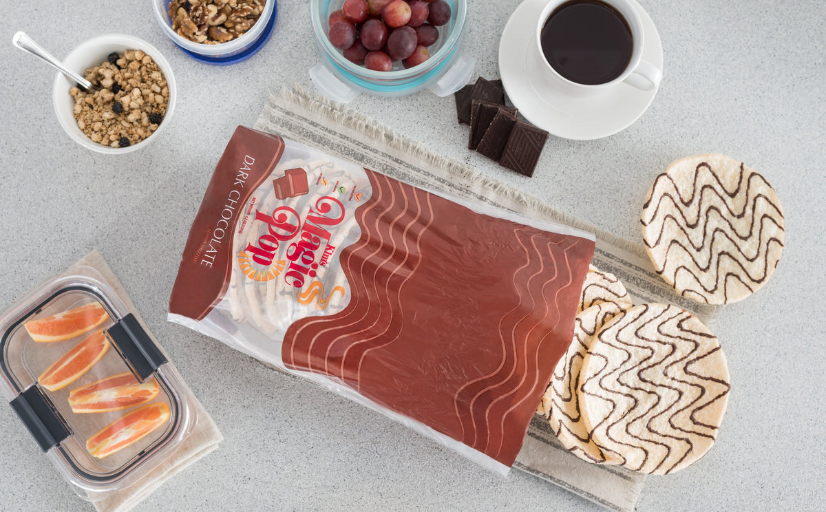 Kim's Magic Pop salted caramel drizzled and dark chocolate snack packs, 6 or 12 pack, Delice Products, crispy and flavorful treats.