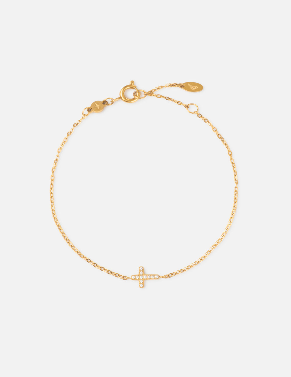 Dainty gem cross link bracelet by Elevated Faith featuring delicate chain and small sparkling cross charms.