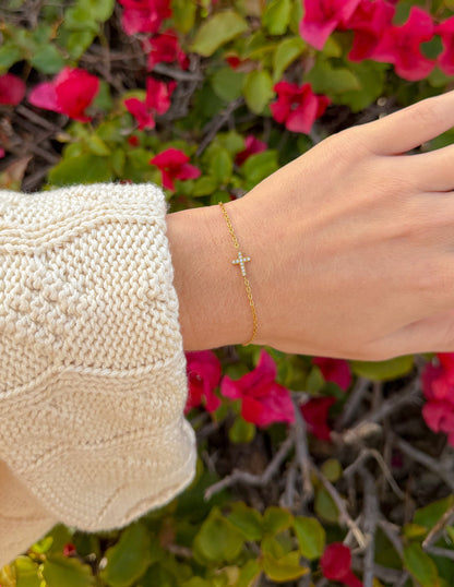 Dainty gemstone cross link bracelet by Elevated Faith featuring delicate chain and small sparkling gem accents.