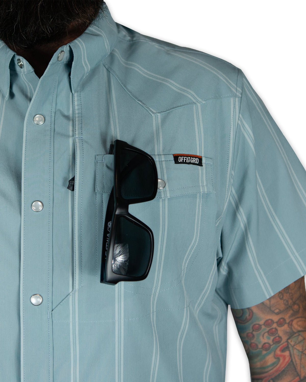 Mid blue short sleeve Daryll SS shirt by Off The Grid Surplus, featuring a casual fit and stylish design.