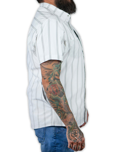 White Daryll SS shirt by Off The Grid Surplus, short sleeve design, laid flat showing front view with collar and buttons.