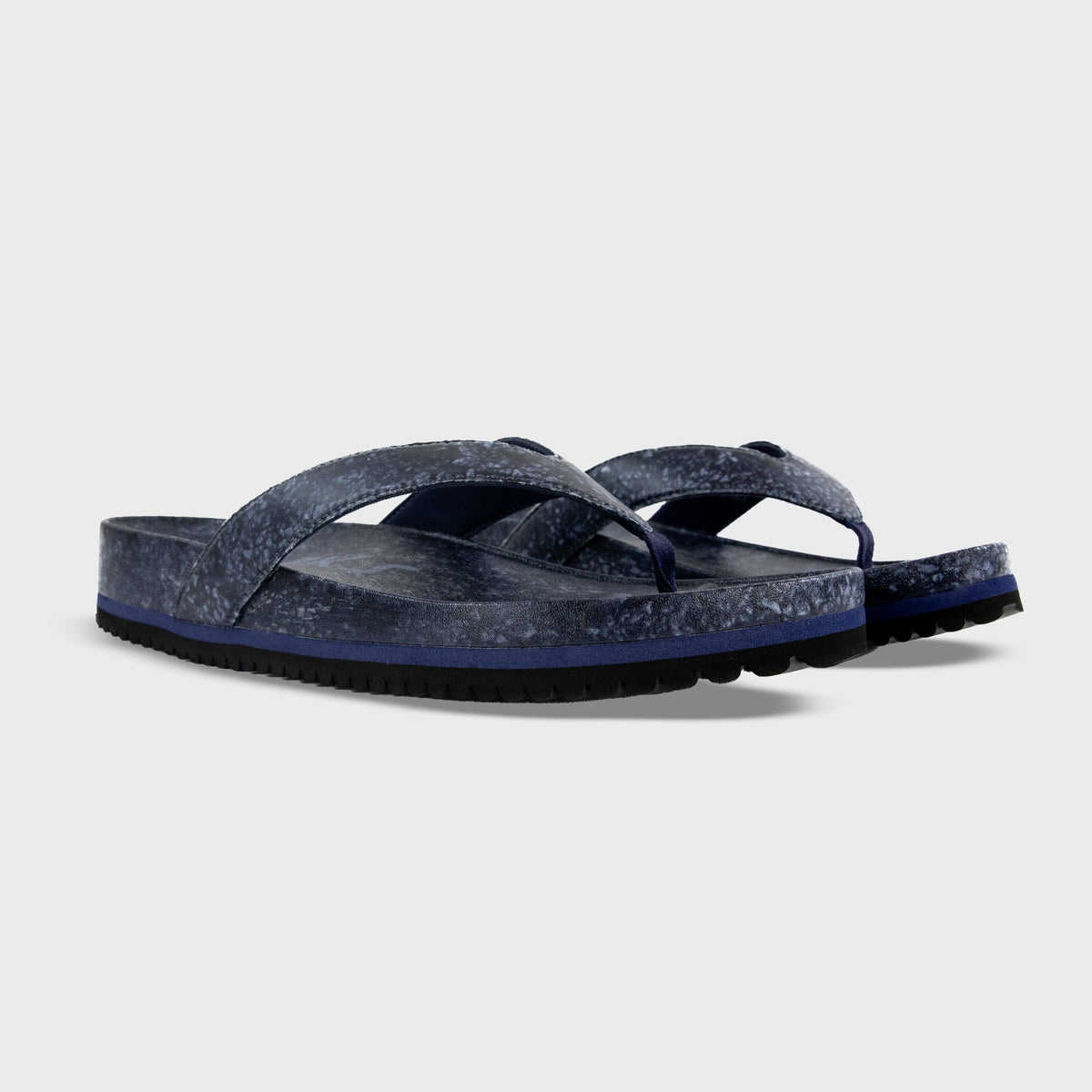 Fleks West Beach Flip Flop in deep blue sea color, showcasing a comfortable sandal with a textured strap and rubber sole.