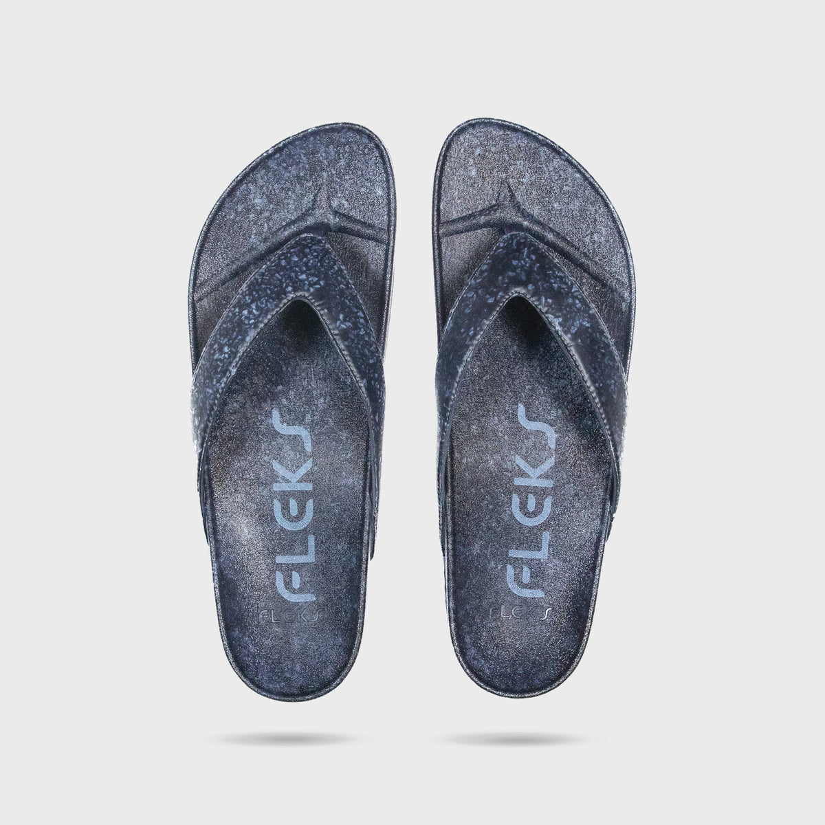 Fleks West Beach Flip Flop in deep blue sea color, with a simple strap design, shown from a vertical angle.