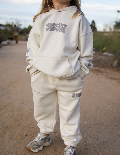 Kids hoodie by Elevated Faith featuring "Deeply Loved" design, made of soft fabric perfect for children.