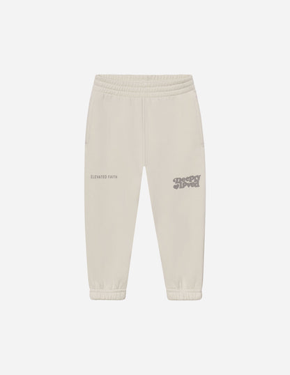 Kids sweatpant from Elevated Faith featuring a soft fabric and "Deeply Loved" print, perfect for comfortable, casual wear.